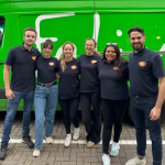 Six Insite employees standing in front of a Felix Project van.