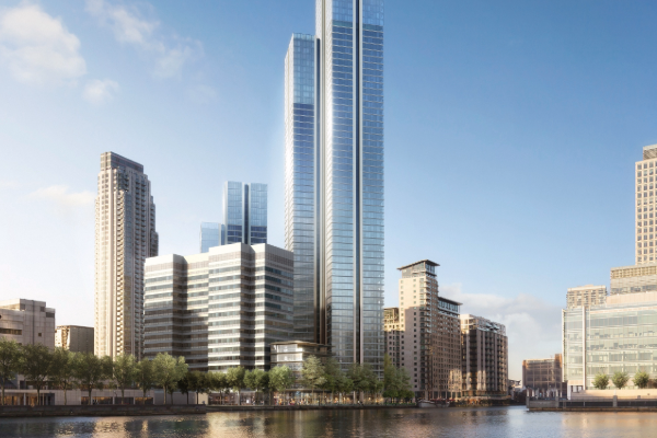Computer‑generated image of the South Quay Plaza residential development, showing tall glass‑clad tower buildings rising above lower surrounding blocks beside a dockside waterway. Trees line the waterfront at ground level, with the Canary Wharf skyline visible in the background. A “Guru” logo appears in the top‑left corner of the image.